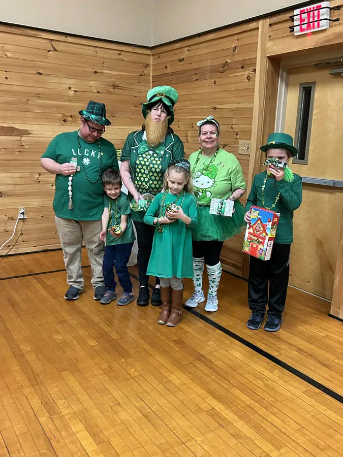 Group of people dressed up for St. Patrick's Day